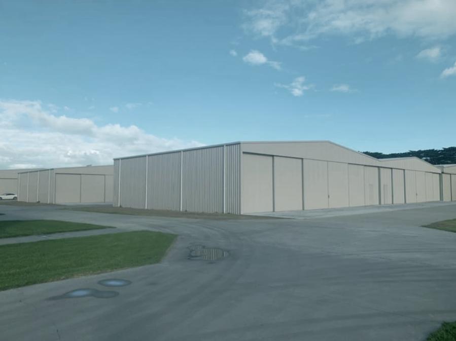 Central Aviation hangar with traditional sliding door system 