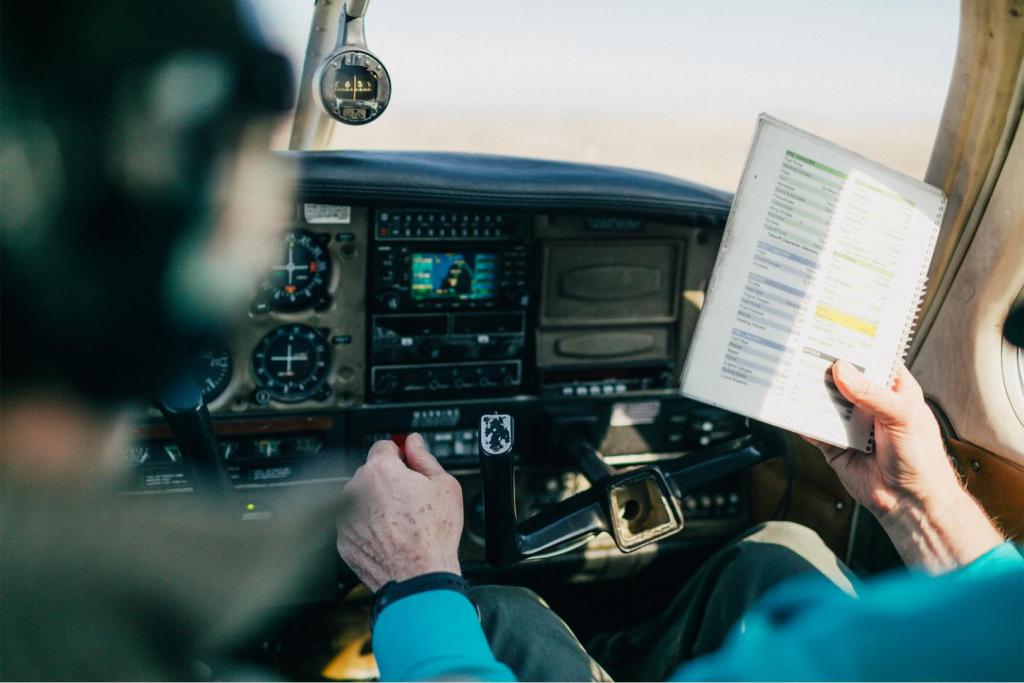 old pilot in cockpit of plane 