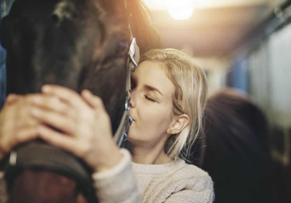girl and her horse close up 