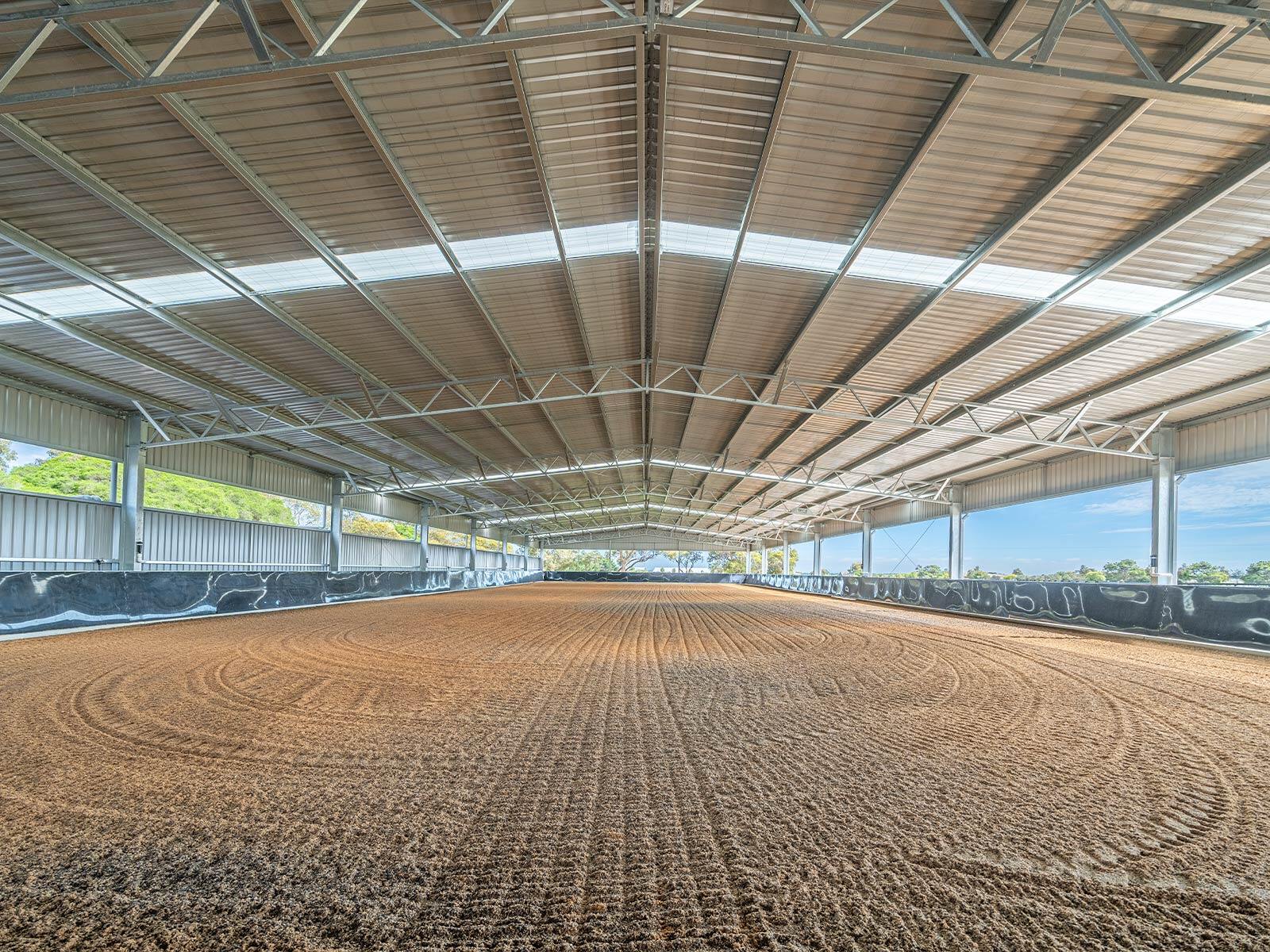Amy Slayter indoor dressage arena and stable complex