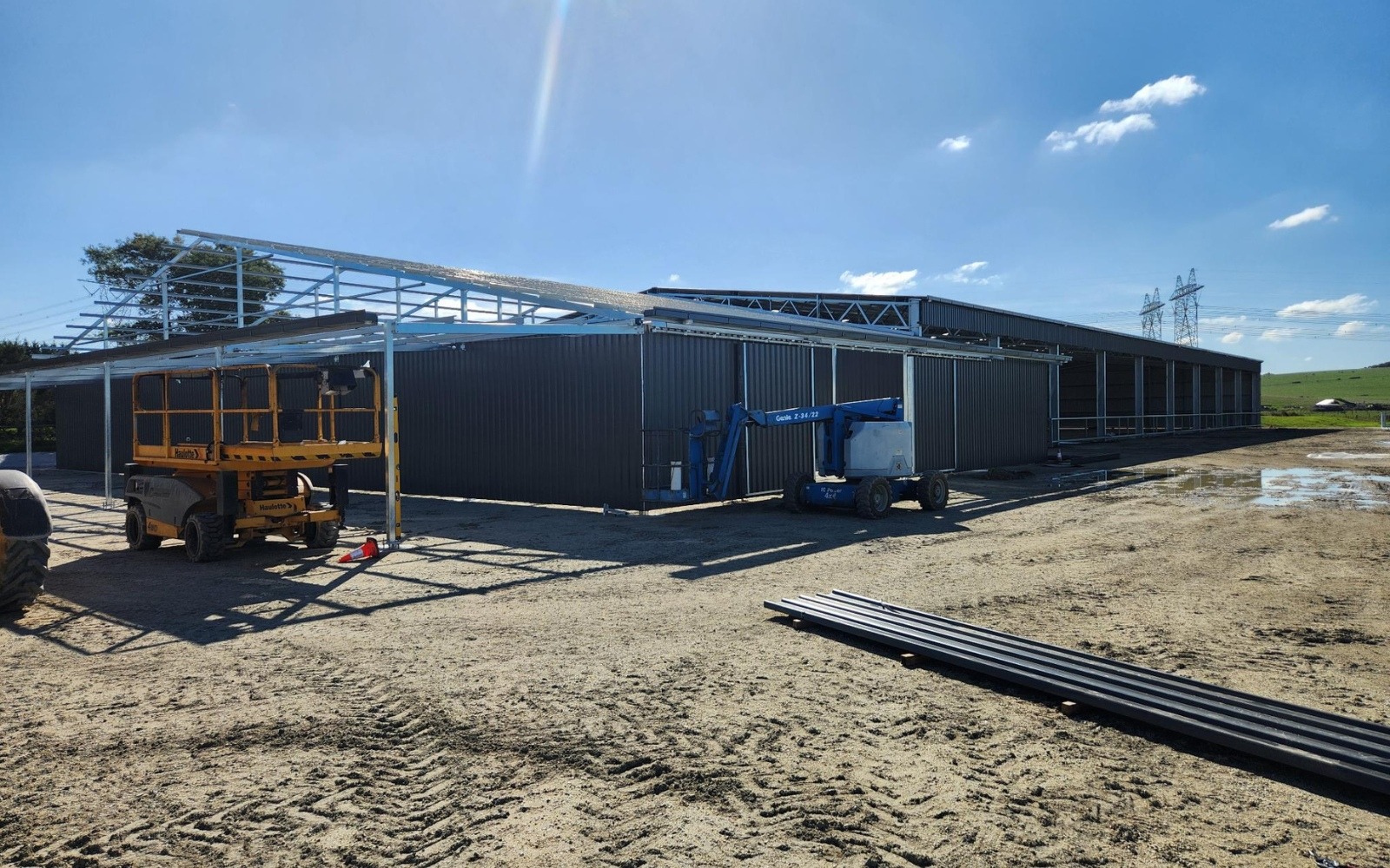 Combined indoor dressage arena and stable complex