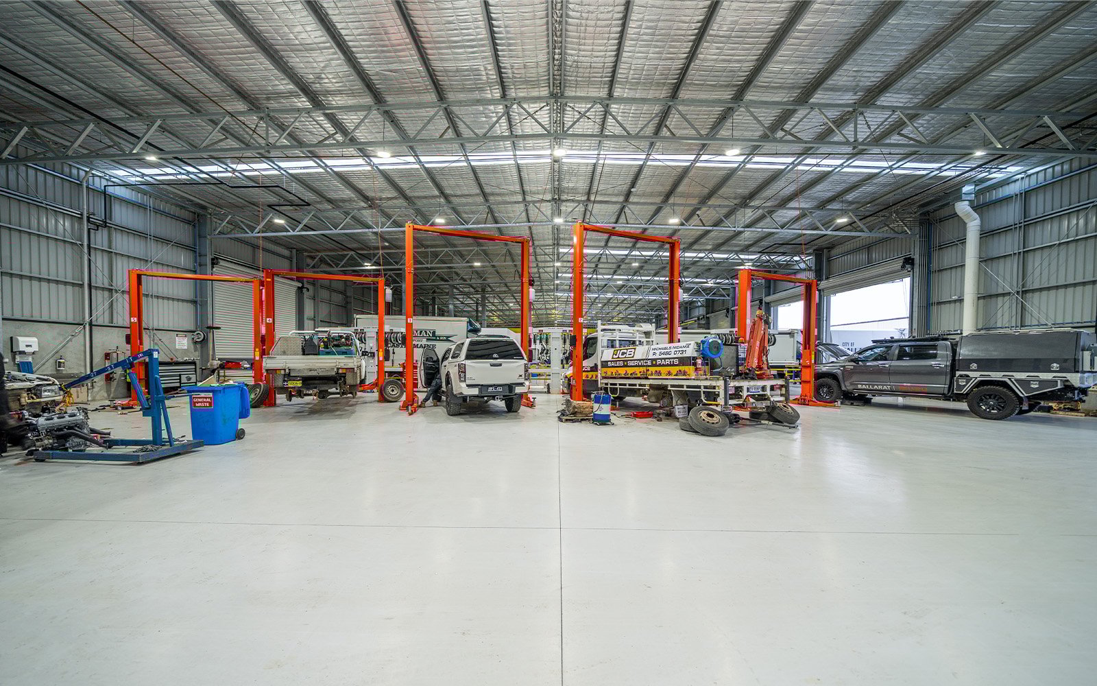 Interior of the Isuzu Ballarat service workshop with Central Steel Build’s custom structural steel framing and overhead gantry system.