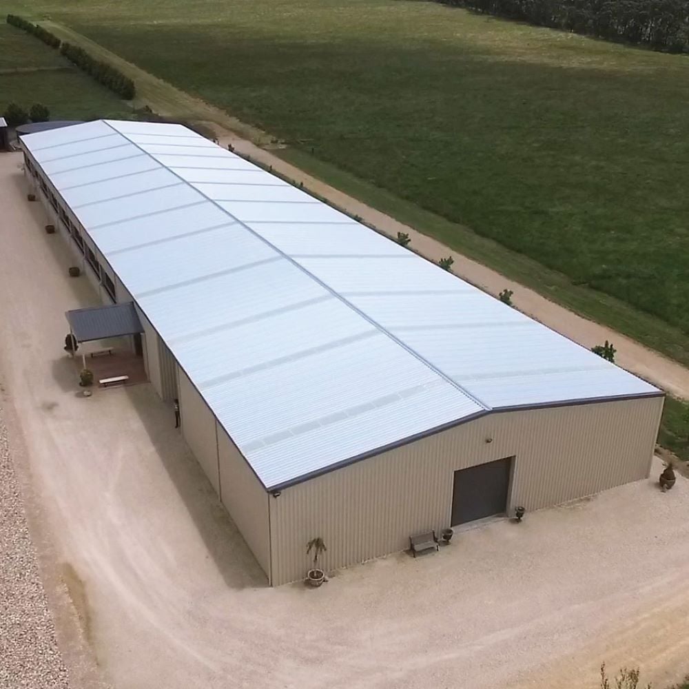 Indoor arena and stable complex