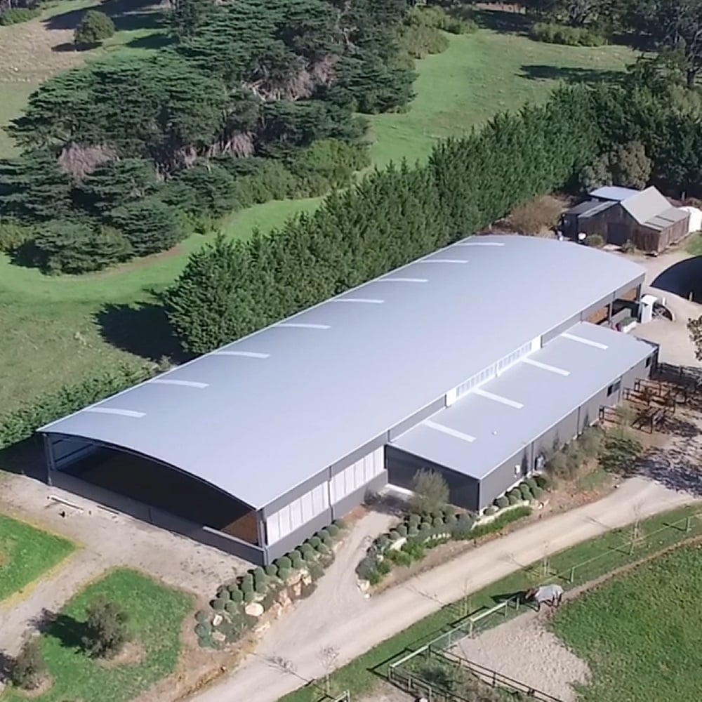 Indoor arena and stable complex