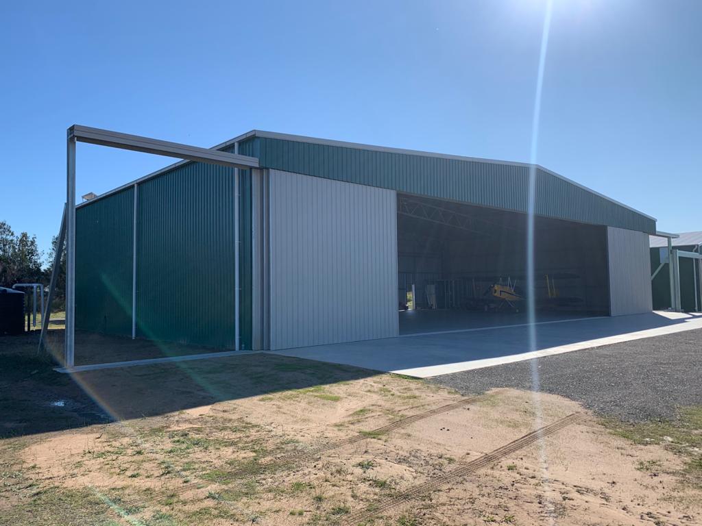 Graham Britten and Michael Murphy aircraft hangar